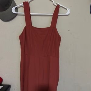 Jump suit wide leg burnt brown with straps has a rip on bottom back need sewing